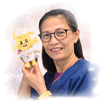 A woman holding a yellow stuffed animal. Description generated by AI